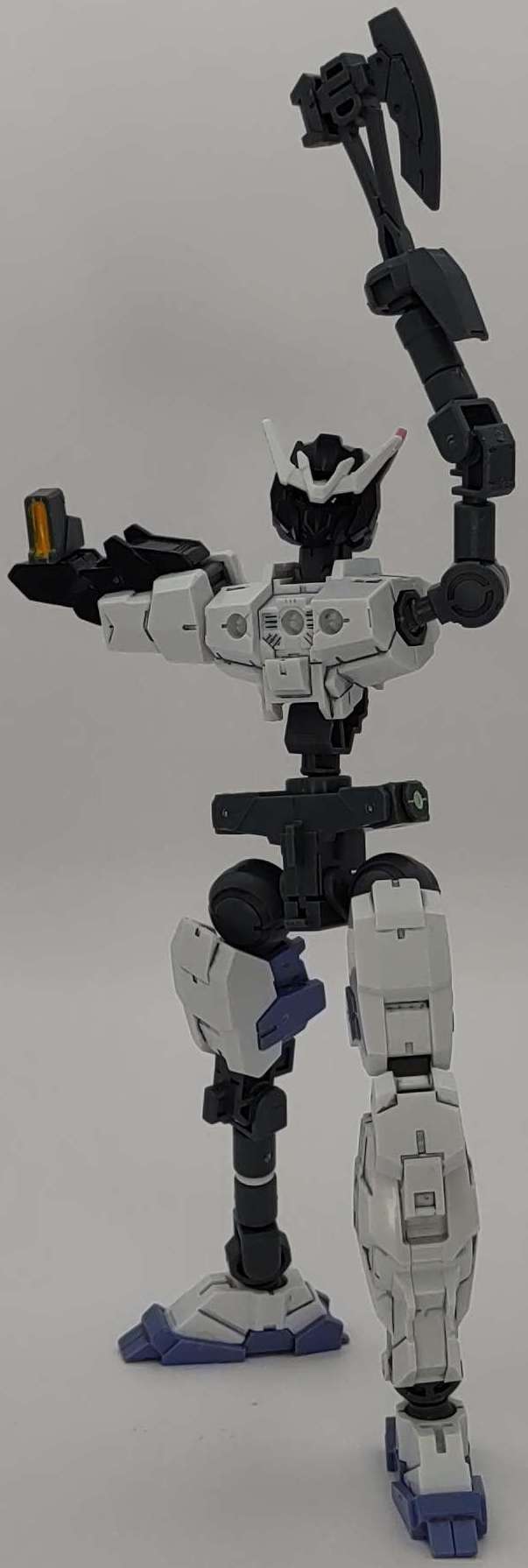 Victory pose with axe arm held high, front view